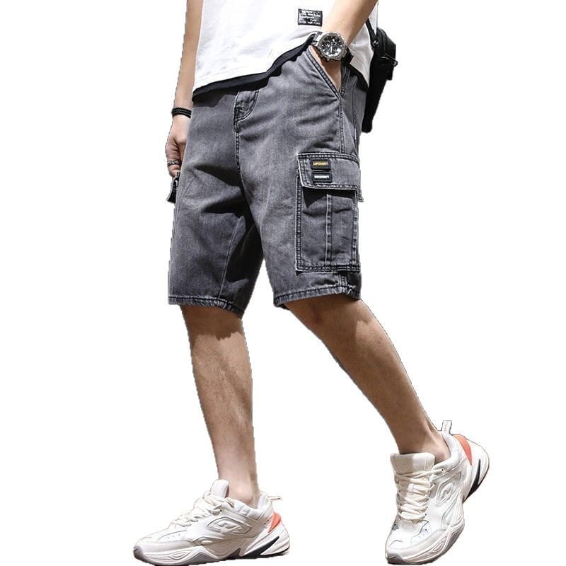 dark gray denim cargo shorts with a cargo pocket and reinforced stitching designed for youth workwear.