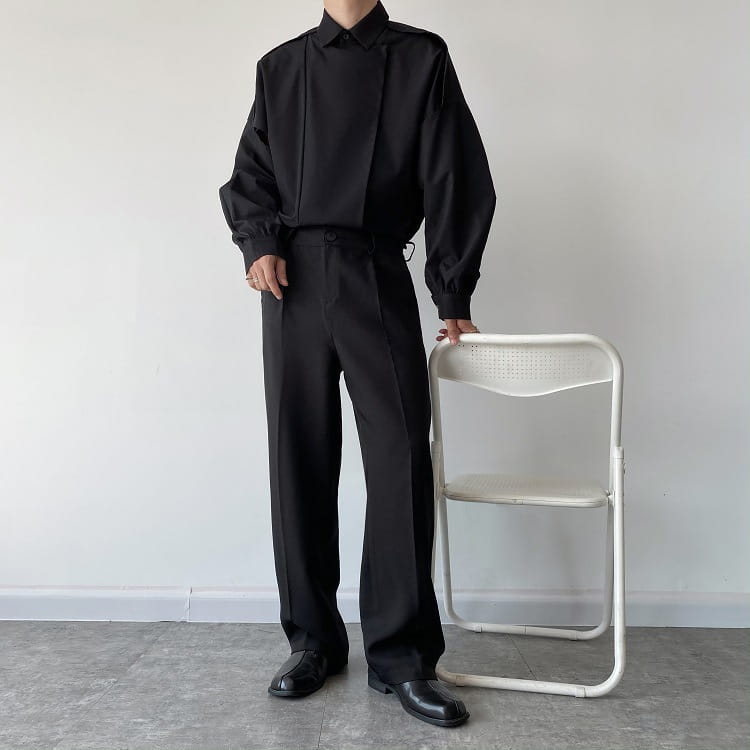 Black men oversized long sleeve button up shirt with a structured collar and relaxed fit.