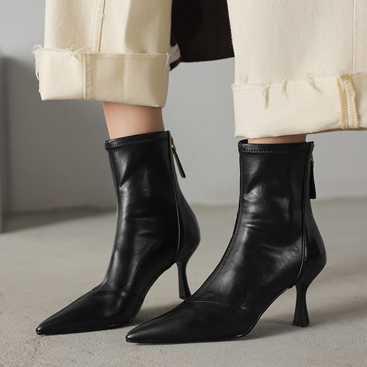 black leather pointed toe cowhide stiletto ankle boots with slender high heel and zipper closure