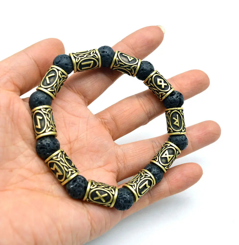 Asgard Silver rune and black lava stone Viking bracelet featuring black lava beads and gold-toned rune bead.