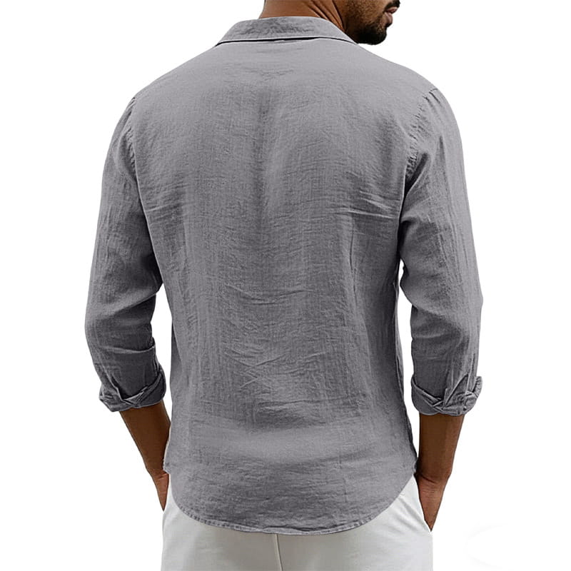 A men’s slim fit gray linen blend long sleeve casual shirt with a classic collar and rolled-up cuffs.