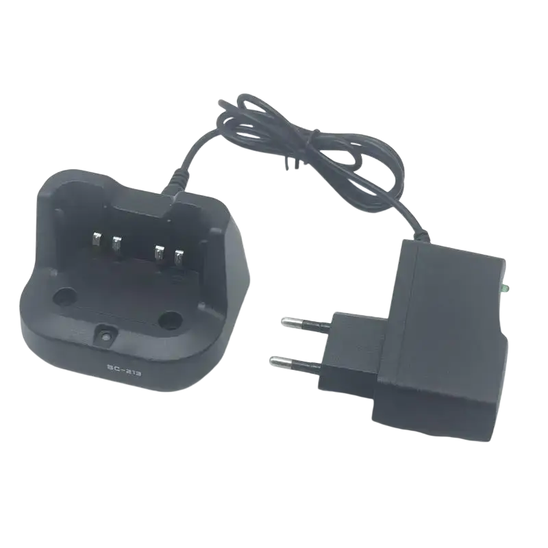 Bc-213 desktop charger for icom radios black plastic base with three metallic contacts and european two-pin power adapter