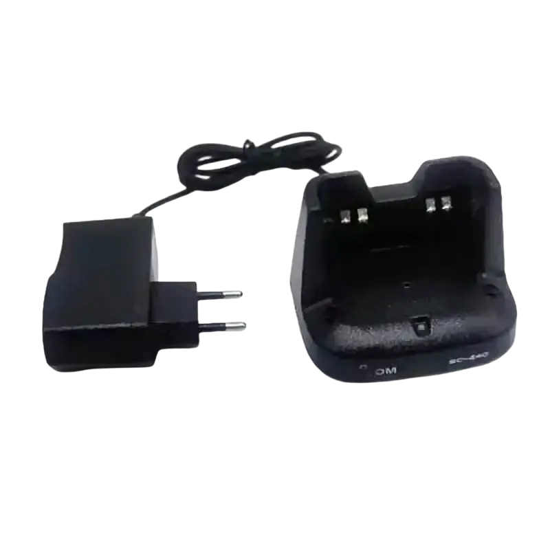 Black plastic bc-240 desktop charger with molded contours and contact points for icom walkie talkie shipping time updates