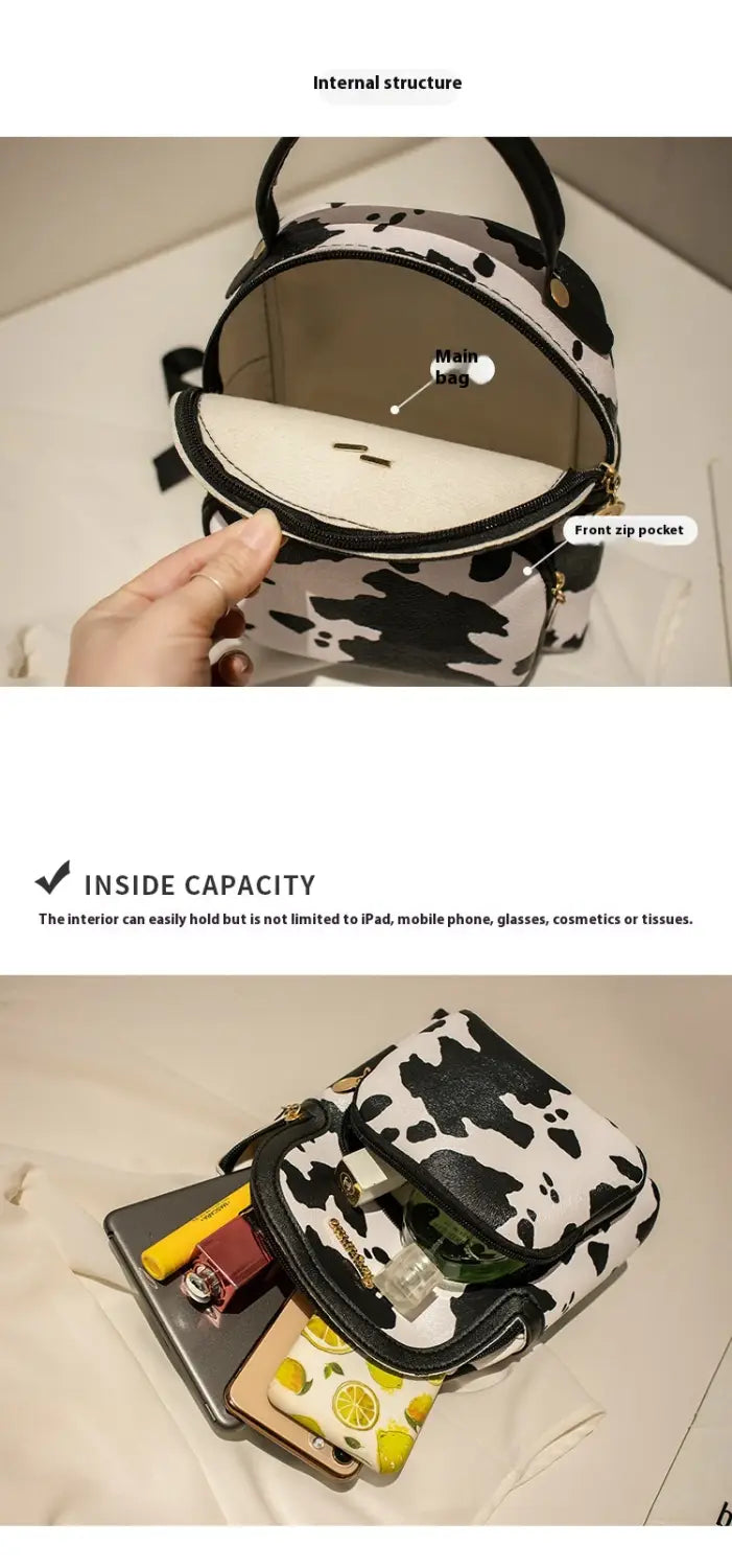 mini backpack with black and white cow print and front zip pocket in korean style.