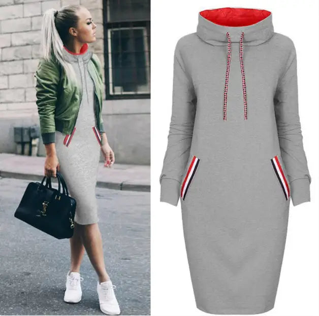 Gray hooded knit dress with red-lined collar and striped drawstrings featuring side pockets accented with matching red white and black stripes in a women’s long sleeve high collar hooded midi dress.