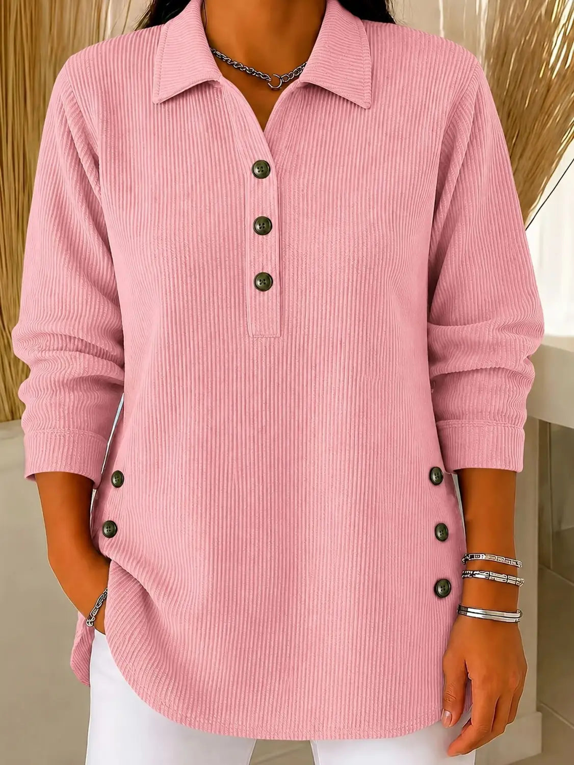 Pink corduroy ribbed button up sweatshirt long sleeve casual top with collar and dark buttons down the front