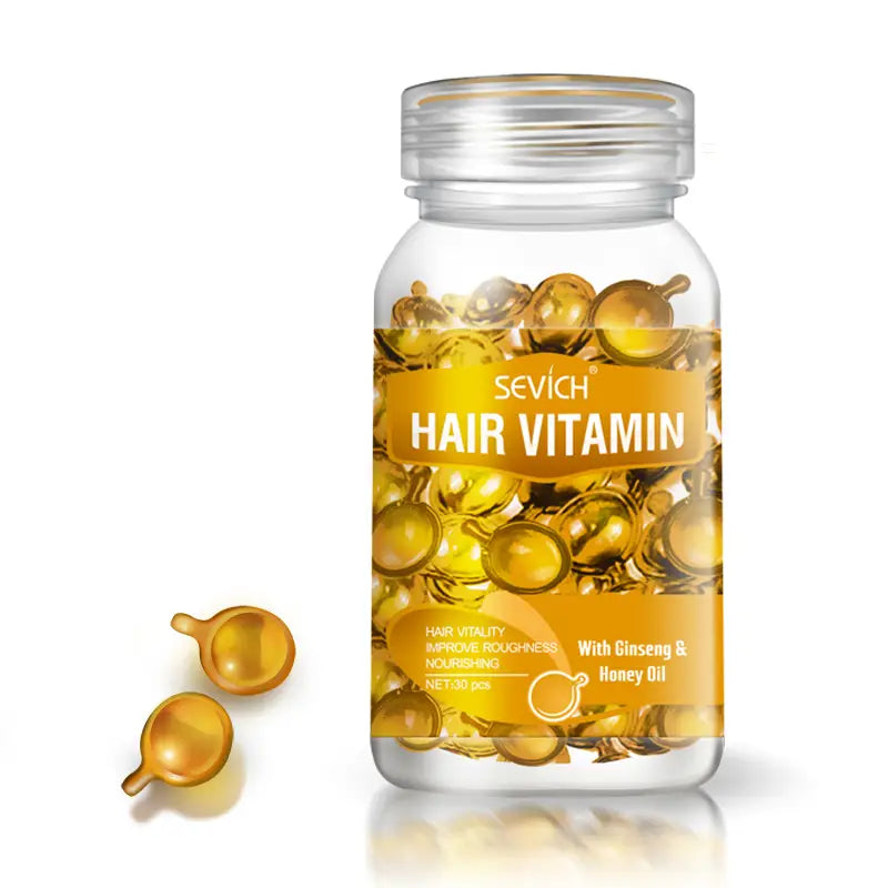 un frasco de vidrio transparente de cápsulas de vitamina para el cabello de color amarillo dorado de la marca sevich con una etiqueta naranja para la reparación y el brillo uniforme