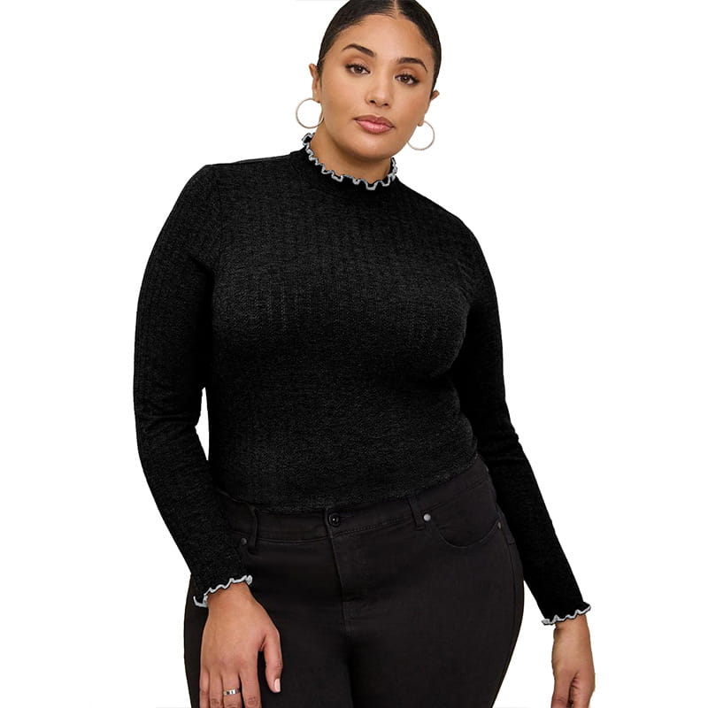 Black ribbed knit slim fit long-sleeve top with white ruffled trim at the mock neck and cuffs for women