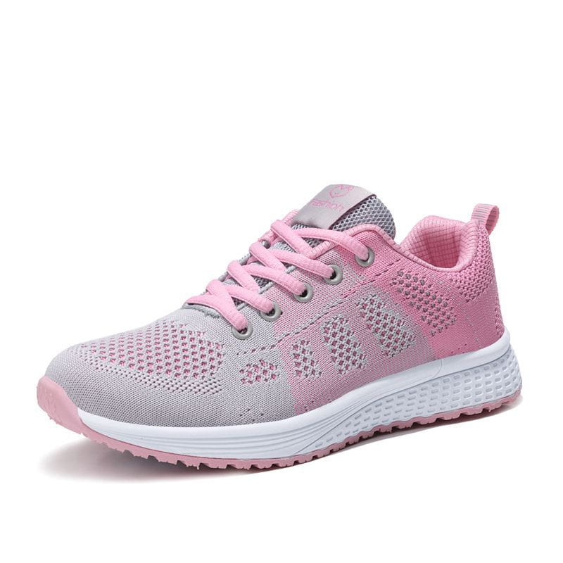 Pink and gray mesh fly woven sneakers with a breathable athletic design and white rubber sole.