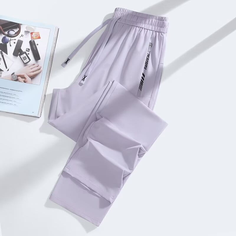 Light purple anti-mosquito casual athletic trousers with a drawstring waistband and side pockets featuring black vertical branding.