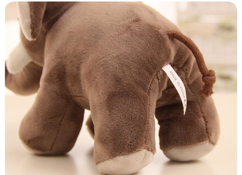 Brown elephant plush toy 25cm made of soft textured fabric with white feet ideal as a stuffed animal doll.