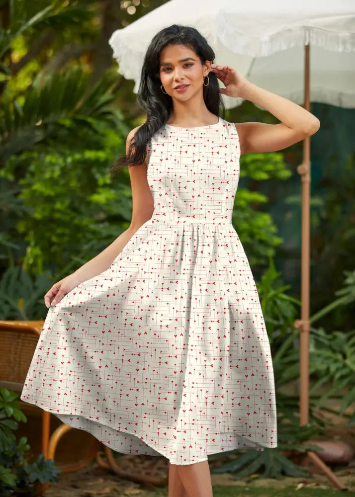 Be mine white heart print 1950s cotton midi dress in white with a subtle red geometric pattern and fitted waist