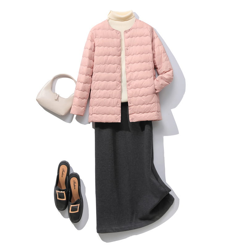 Pink quilted puffer jacket with a ruffled crew neck and button closure for stylish warmth.