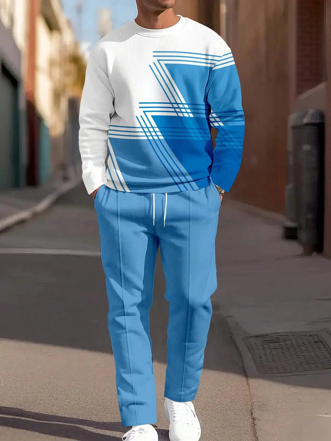 Ensemble sweat à carreaux et pantalon pour hommes, comprenant un sweat-shirt à motif géométrique bleu et blanc, avec des joggings bleus assortis, adaptés à un usage décontracté.
