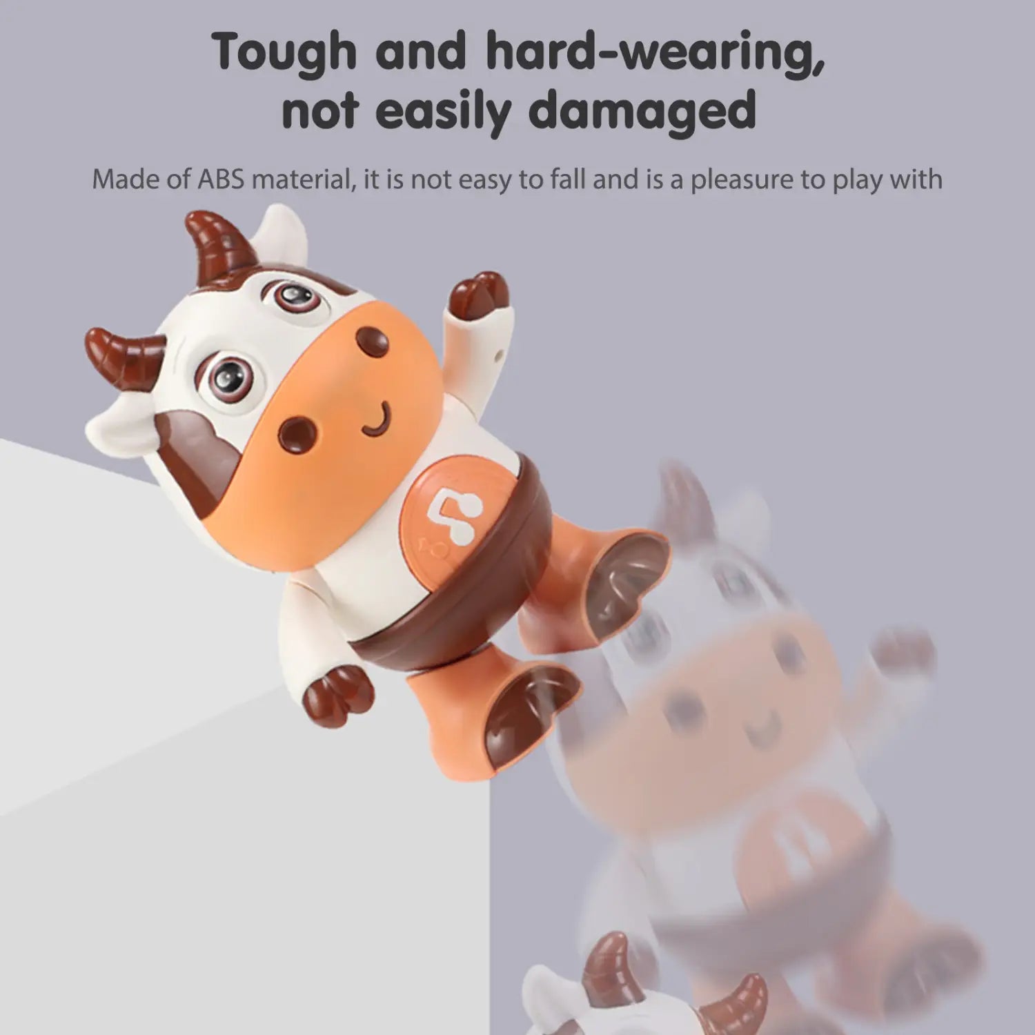 A cheerful orange and white plastic dancing cow musical robot toy with brown horns eyes and hooves.