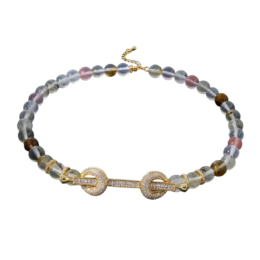 Beaded choker necklace featuring clear pink and brown gemstone beads with gold-toned clasp and cubic zirconia accents