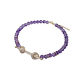 A delicate purple amethyst bead bracelet with a gold-toned diamond clasp matching beaded choker necklace cubic zirconia jewelry