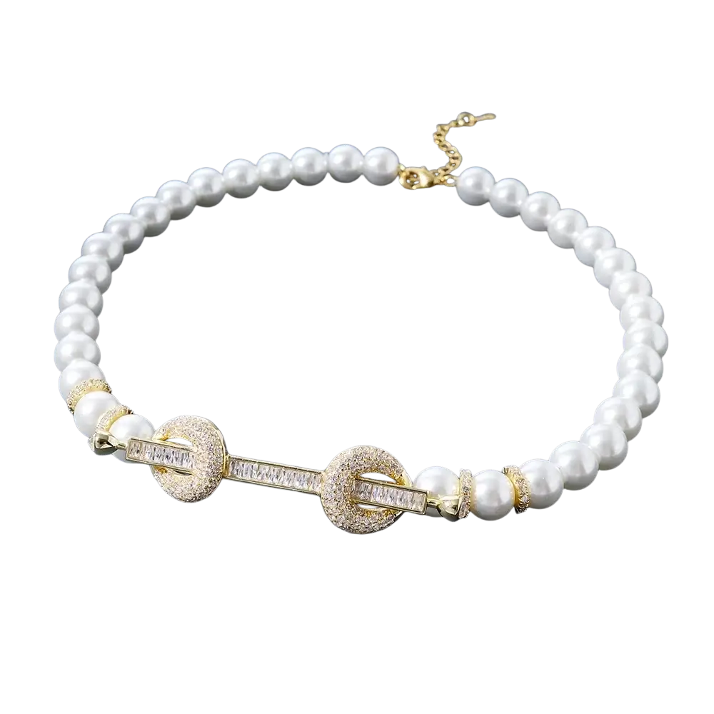 Elegant beaded choker necklace with pearl beads and a gold-toned clasp featuring cubic zirconia and diamond accents