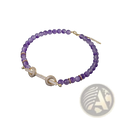 A delicate purple amethyst bead bracelet with a gold-toned diamond clasp matching beaded choker necklace cubic zirconia jewelry