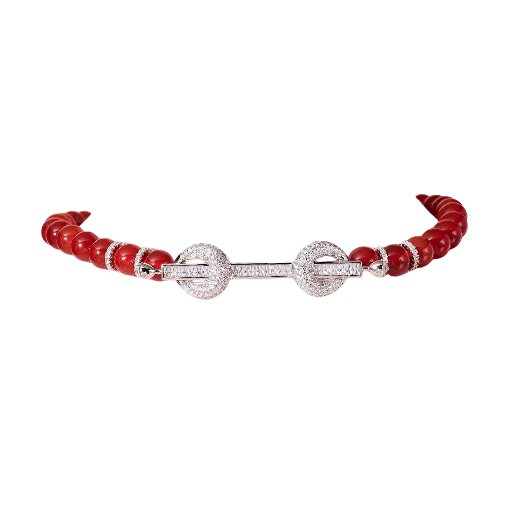 A beaded choker necklace with striking red coral beads and a silver-toned pavé diamond cubic zirconia clasp