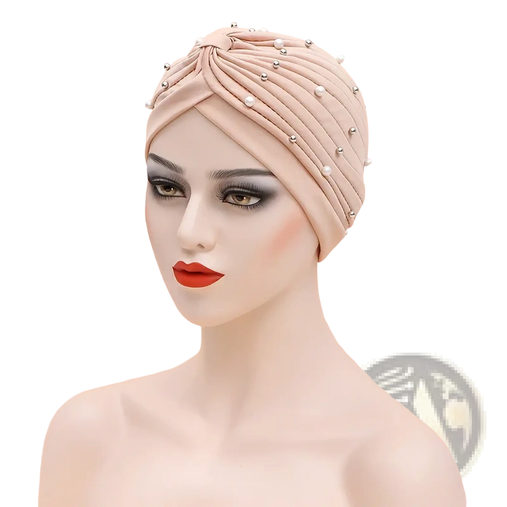Beige beaded cotton turban hat for women with pearl and silver bead embellishments on the front side