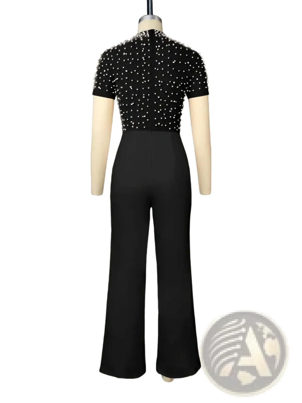 Black beaded short-sleeve top paired with high-waisted wide-leg pants on a mannequin elegant party jumpsuit