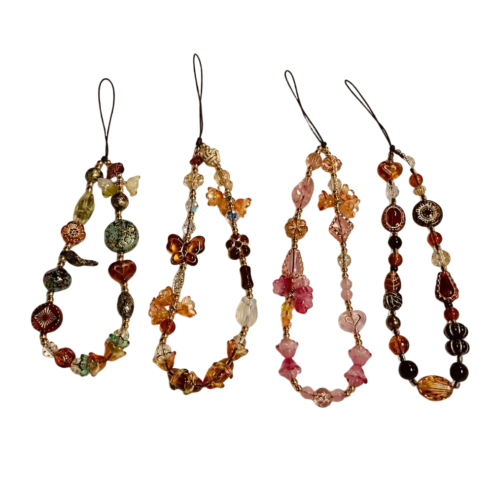 Four handcrafted beaded phone charm wrist lanyards with amber glass beads and butterfly accents in vintage style