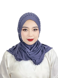 A soft lavender beaded pullover Muslim hijab scarf with delicate embellishments along the edges