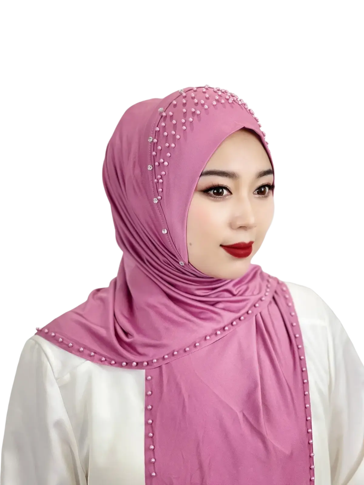 A soft pink beaded pullover muslim hijab scarf with delicate pearl-like embellishments along the edges
