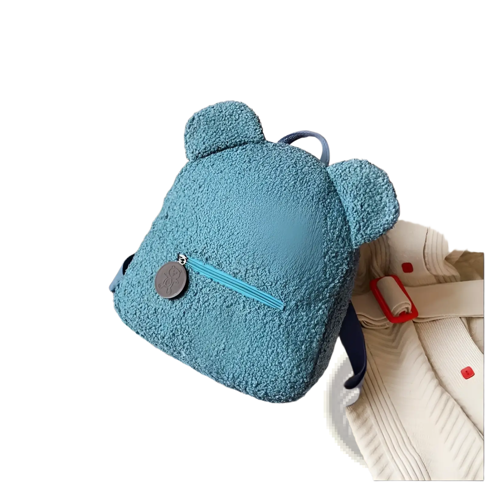 Blue fuzzy bear-shaped plush backpack with teal zipper and silver charm made of soft fleece material