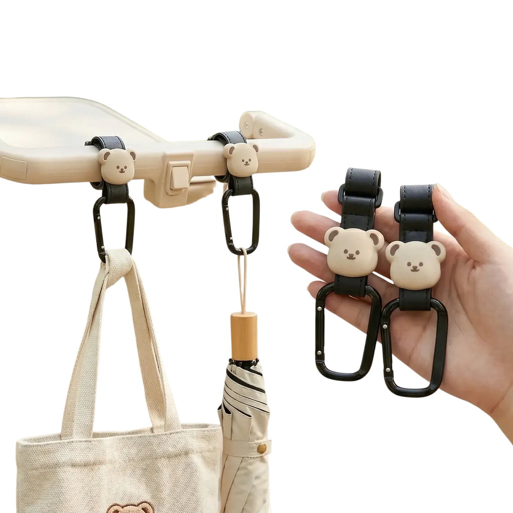 Beige bear-shaped pu leather stroller hooks with black carabiner clips for hanging bags securely on strollers