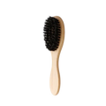 Beard brush with light wood handle and dense black boar bristle for grooming and styling facial hair