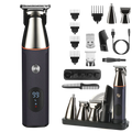 Black and silver electric beard trimmer with orange accent ring digital display and multiple attachments grooming kit