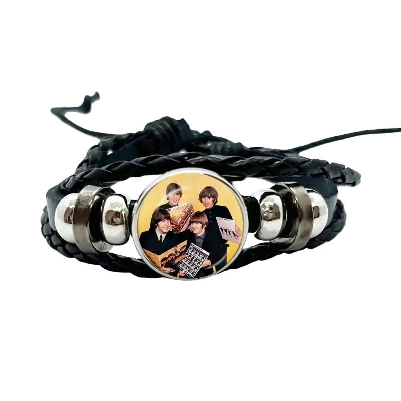 Black braided leather bracelet with silver-toned beads and a circular glass dome charm featuring The Beatles 1960s photo