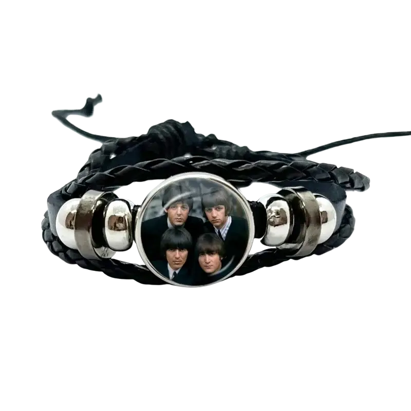 Black braided leather bracelet with a circular glass dome charm featuring the Beatles and silver-toned metallic beads