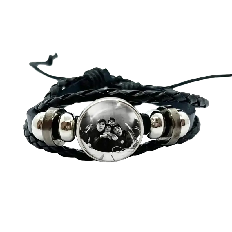 Black braided leather bracelet with a silver-toned clasp featuring a black-and-white photo of the Beatles