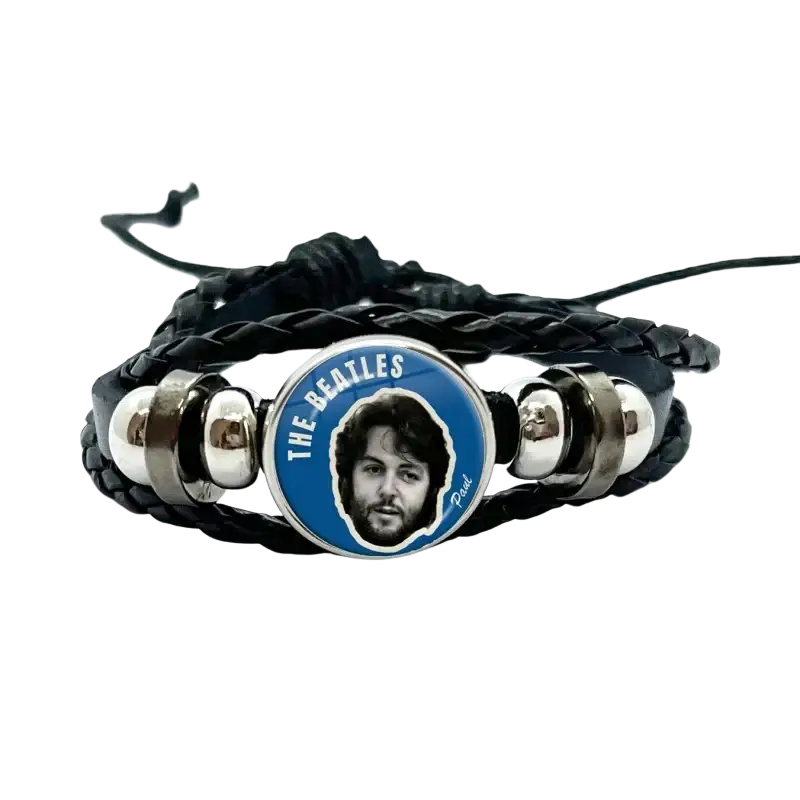 Black braided leather bracelet with blue and silver circular charm featuring paul mccartney portrait from the beatles