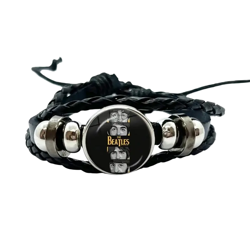Black braided leather bracelet with circular glass charm featuring the Beatles portrait and gold lettering flanked by silver beads