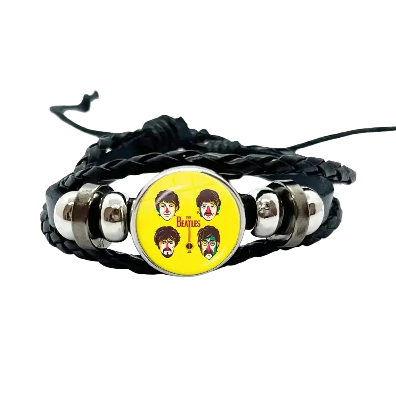 Black braided leather Beatles bracelet with yellow circular charm featuring faces and silver-toned metal beads