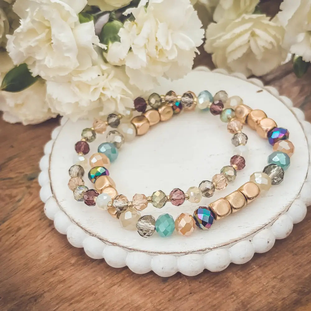 Bohemian earth tone iridescent beaded stacking bracelet set with gold teal rose clear crystals and matte metallic beads