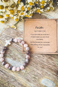Pink and gray marbled stone stacking bracelet with a white plastic cross accent as a faith-themed gift
