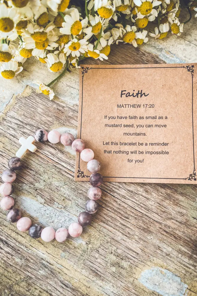 Pink and gray marbled stone stacking bracelet with a white plastic cross accent as a faith-themed gift