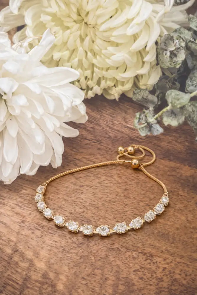 Beautiful Glimmer gold crystal beaded bracelet with clear faceted crystals on a delicate gold-toned beaded chain