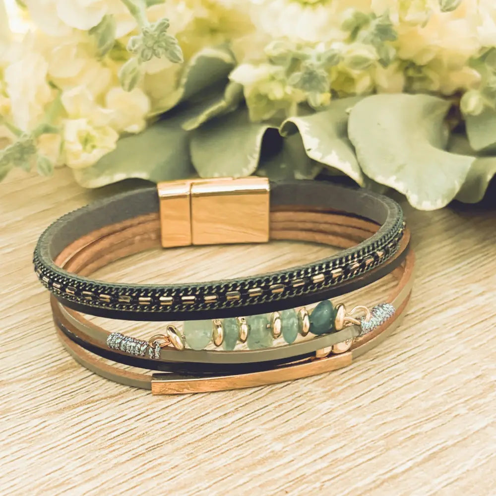 Layered green gemstone and leather magnetic bracelet with multi-layered leather, rose gold clasp, and decorative green beads