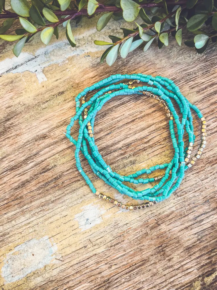 Boho turquoise and gold beaded stacking wrap bracelet featuring vibrant turquoise beads and gold accents for versatile wear