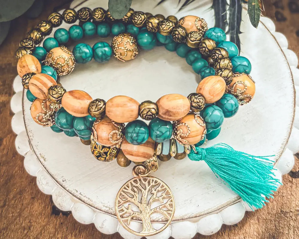 Turquoise tree of life and wood beaded bracelet set with gold-toned beads pendant and matching tassel