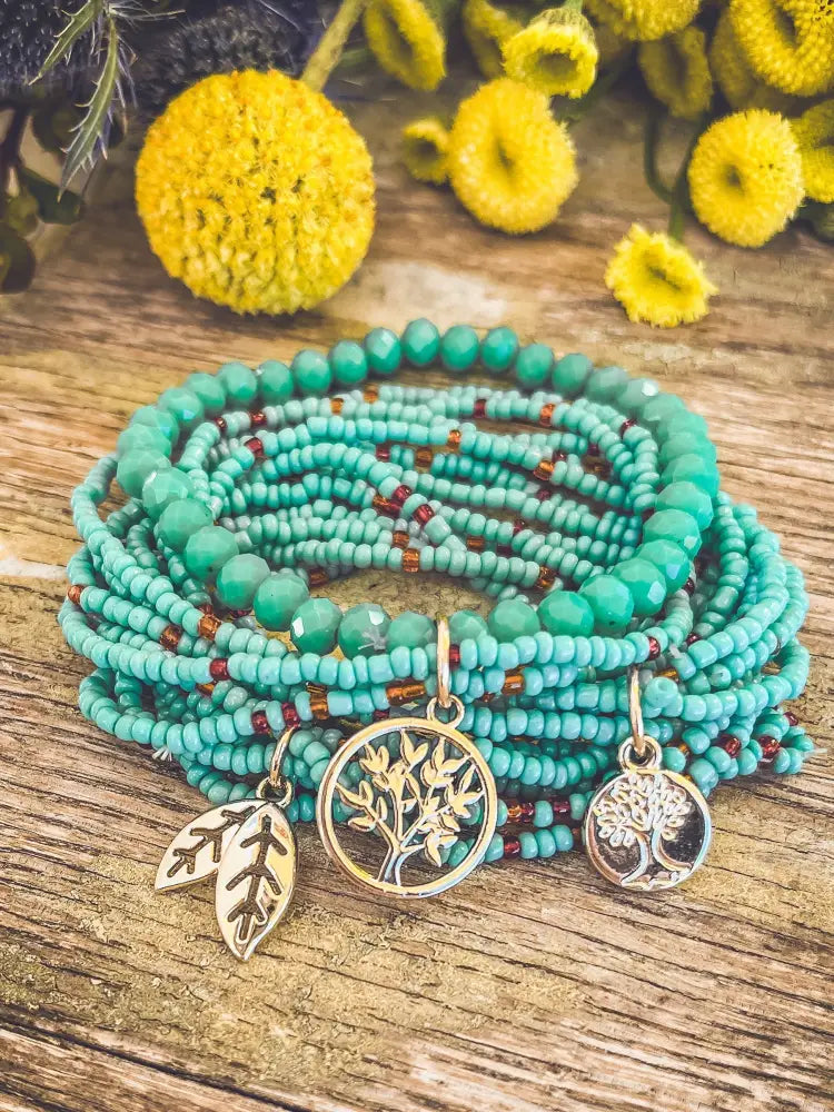 Turquoise tree of life beaded wrap bracelet set with silver tree of life and leaf charms in turquoise beads