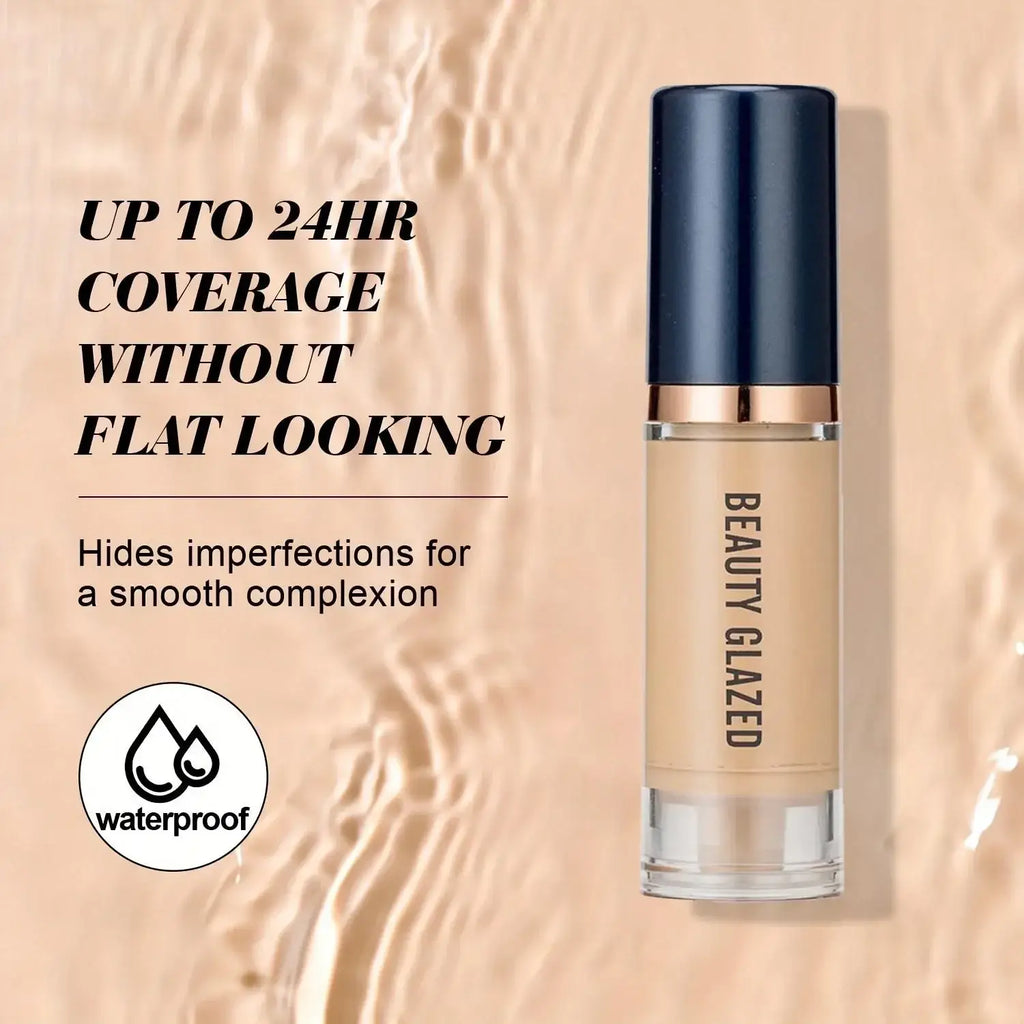 Beauty glazed makeup set liquid foundation in a transparent glass bottle with navy blue cap and rose gold band