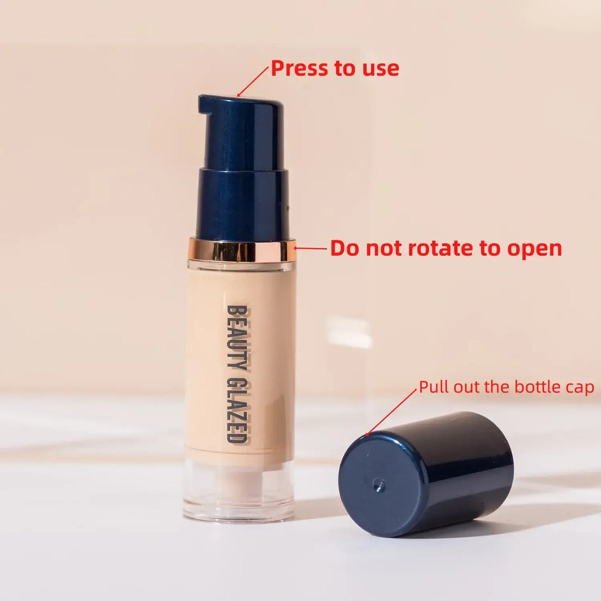 Beauty glazed makeup set liquid foundation in a sleek transparent bottle with navy blue and gold accents and puff