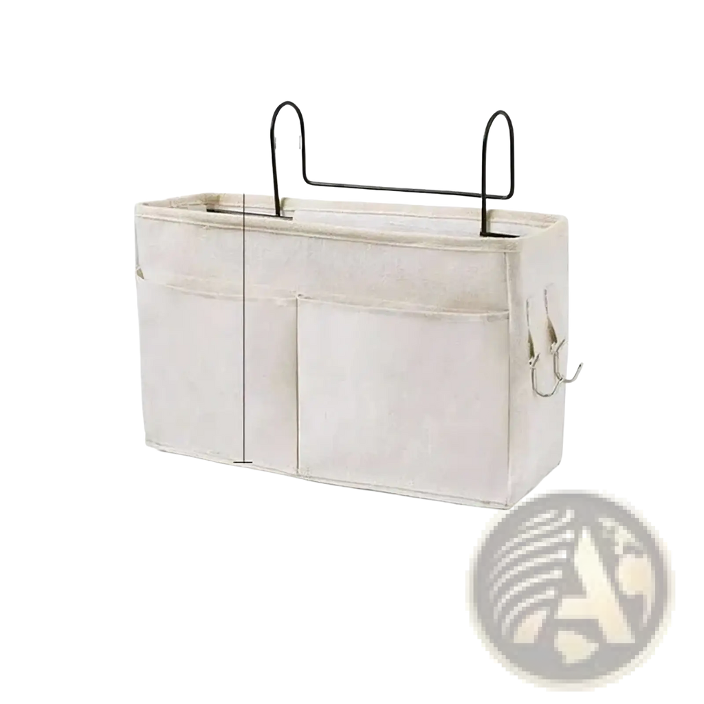 Beige linen bedside storage caddy hanging organizer with black metal handles and hooks for easy bedside storage